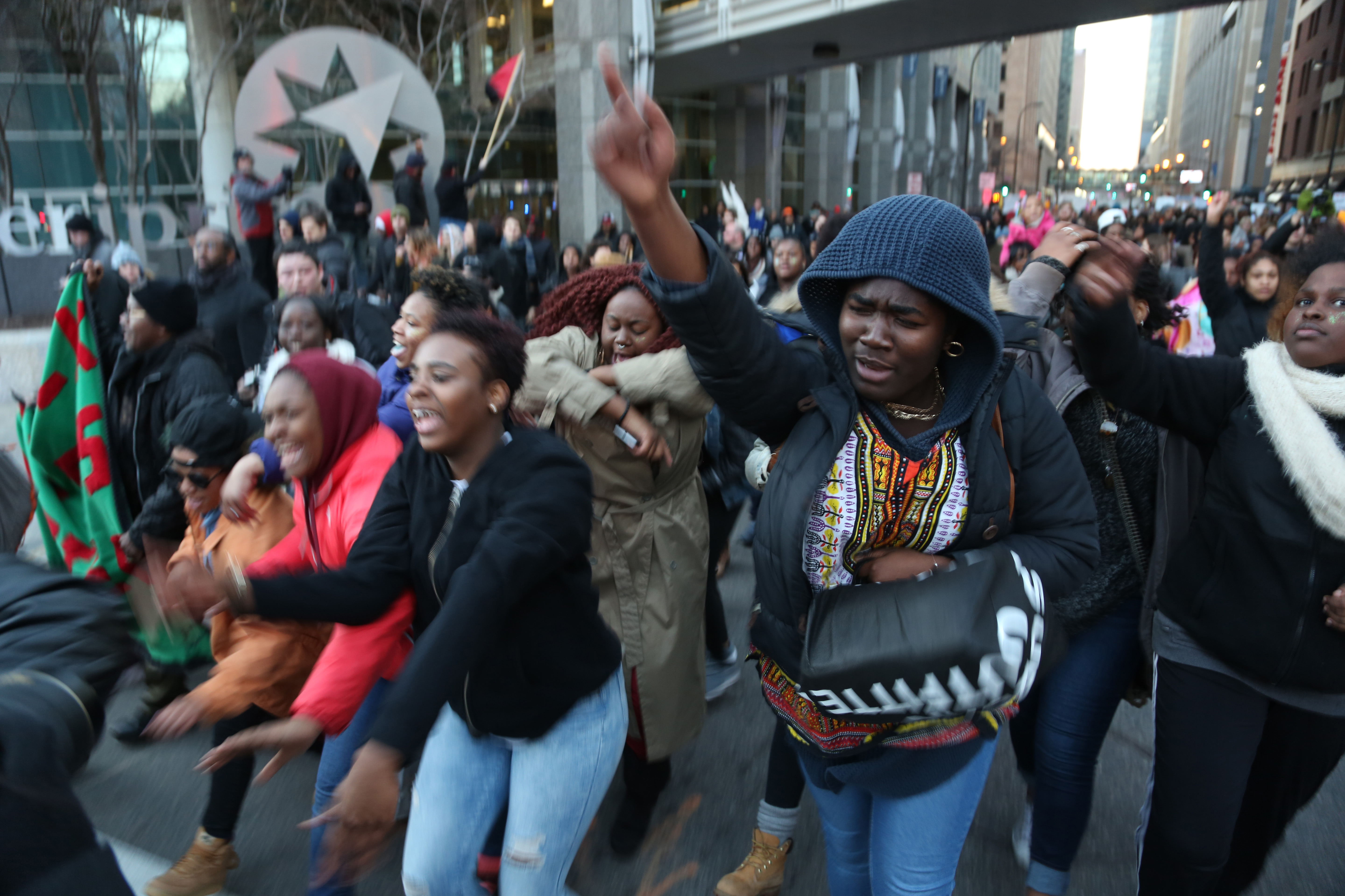 Protesters danced to music as they headed to the federal court house. ] (KYNDELL HARKNESS/STAR TRIBUNE) kyndell.harkness@startribune.com Protesters at the Minneapolis Fourth Precinct in Minneapolis Min., Saturday November 24, 2015.