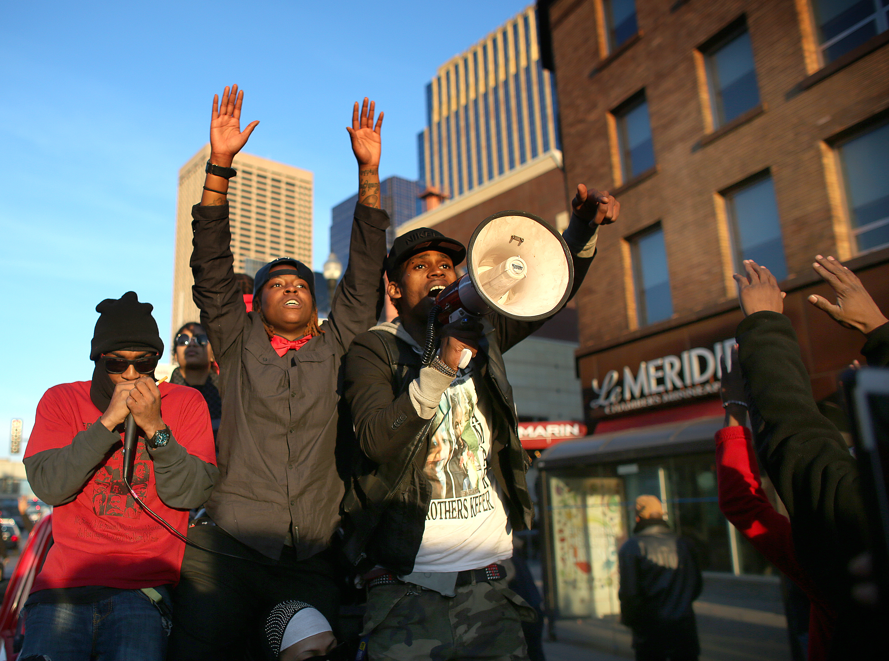 Alexander Clark lead the chants as more than 1000 protesters headed to the federal court house. ] (KYNDELL HARKNESS/STAR TRIBUNE) kyndell.harkness@startribune.com Protesters at the Minneapolis Fourth Precinct in Minneapolis Min., Saturday November 24, 2015.